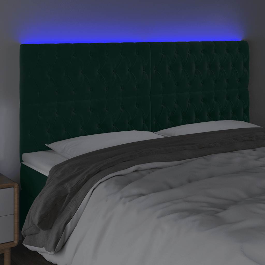 sengegavl med LED-lys 180x7x118/128 cm fløjl mørkegrøn
