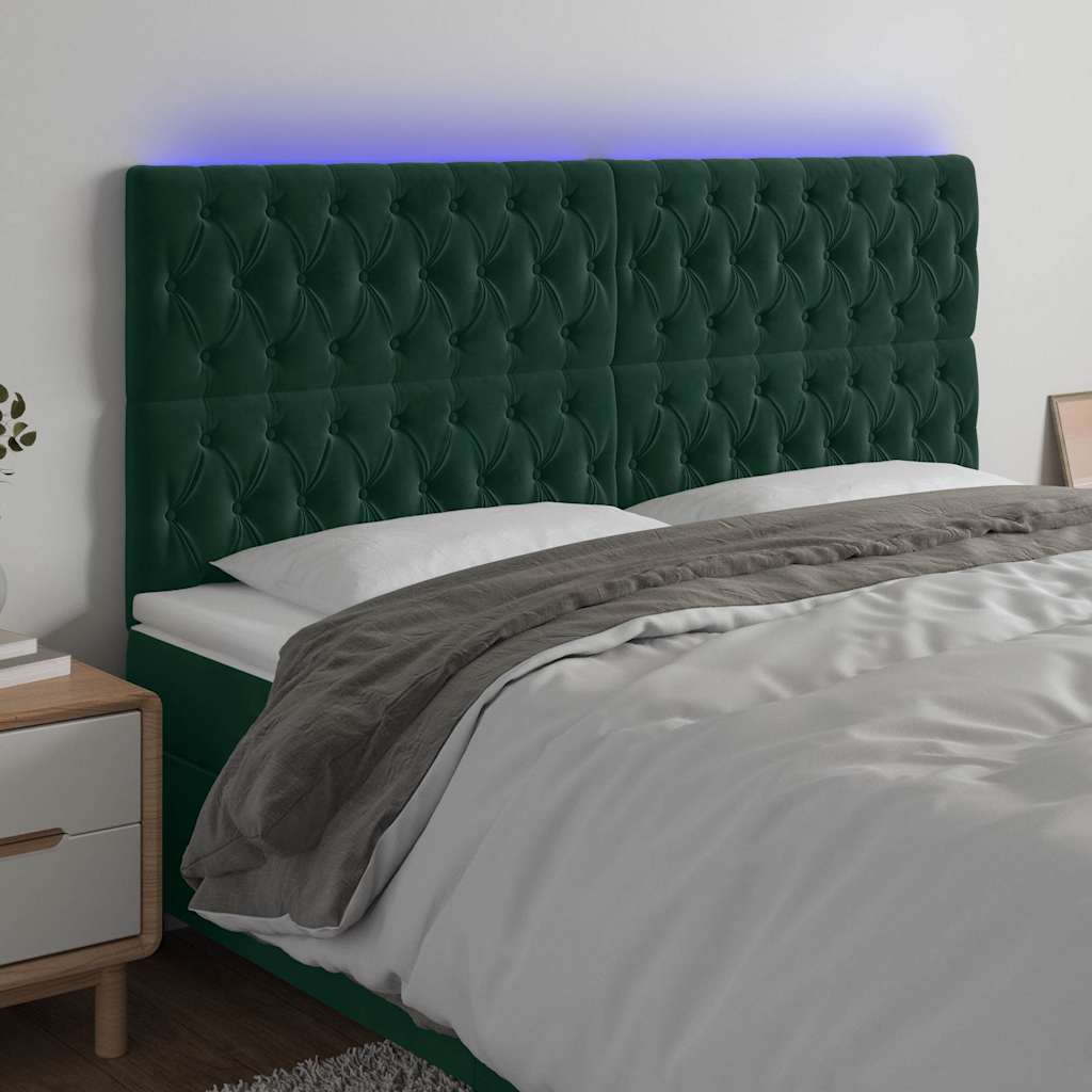 sengegavl med LED-lys 200x7x118/128 cm fløjl mørkegrøn