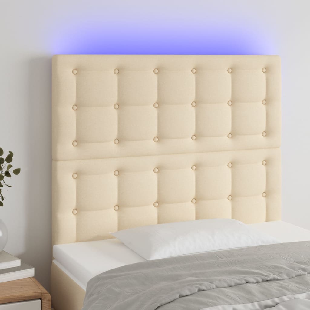 sengegavl med LED-lys 90x5x118/128 cm stof cremefarvet