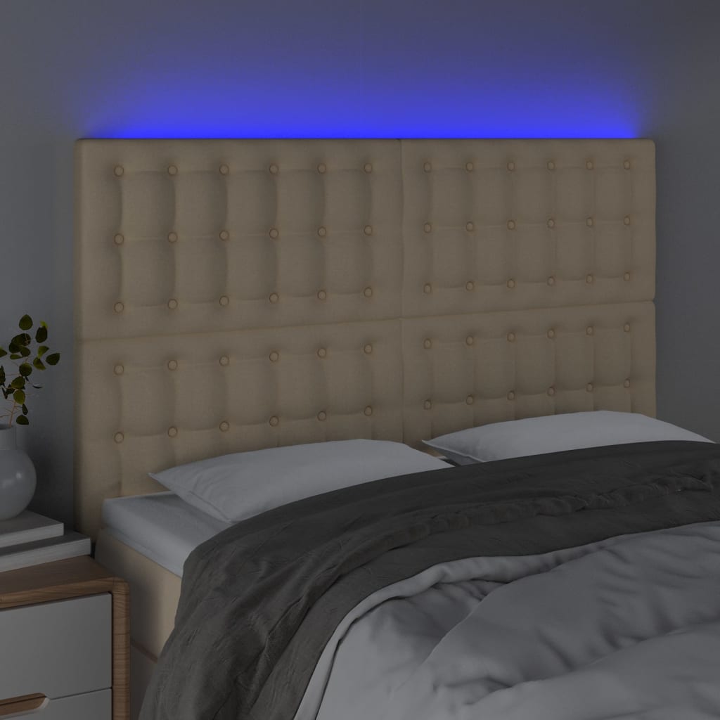 sengegavl med LED-lys 144x5x118/128 cm stof cremefarvet