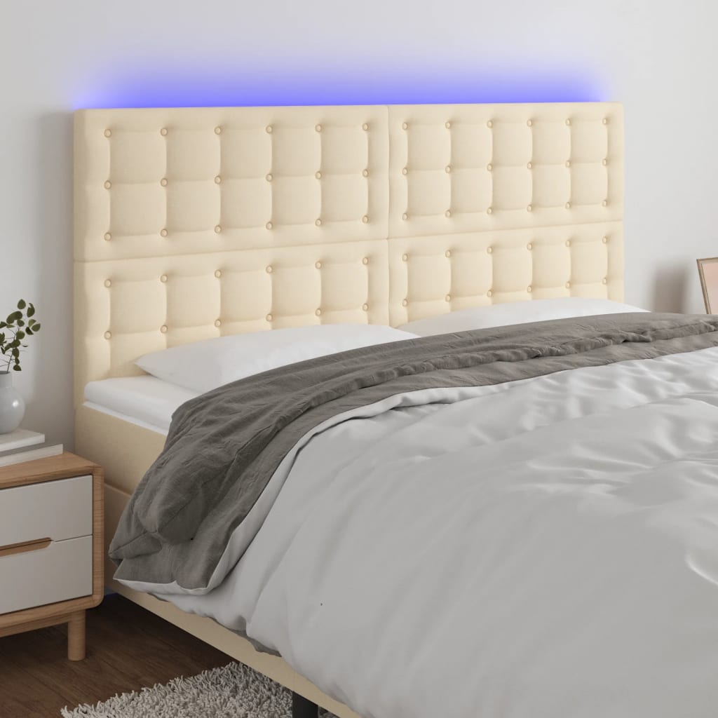 sengegavl med LED-lys 160x5x118/128 cm stof cremefarvet