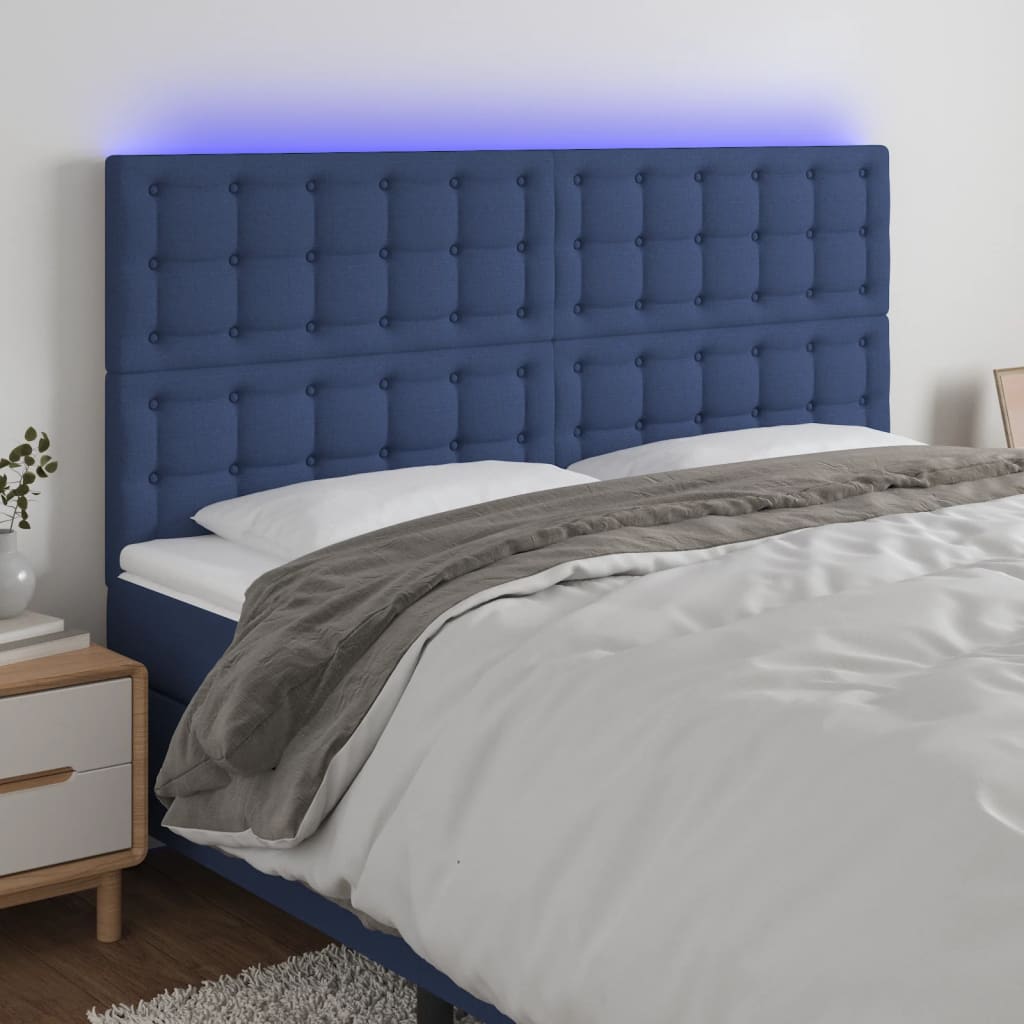 sengegavl med LED-lys 160x5x118/128 cm stof blå
