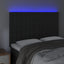 sengegavl med LED-lys 144x5x118/128 cm fløjl sort
