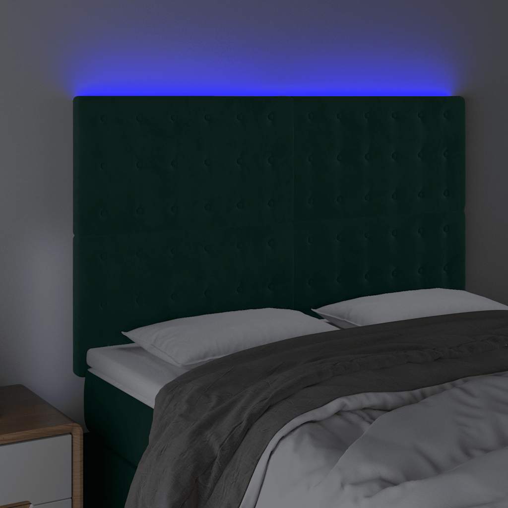 sengegavl med LED-lys 144x5x118/128 cm fløjl mørkegrøn