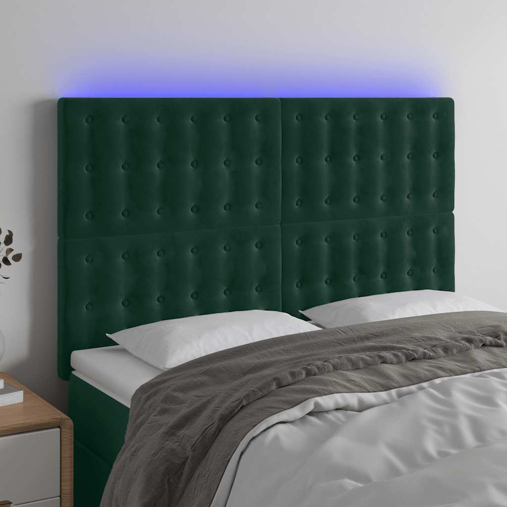 sengegavl med LED-lys 144x5x118/128 cm fløjl mørkegrøn