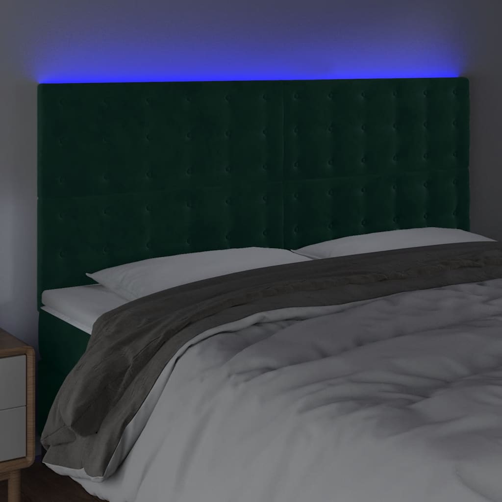sengegavl med LED-lys 160x5x118/128 cm fløjl mørkegrøn