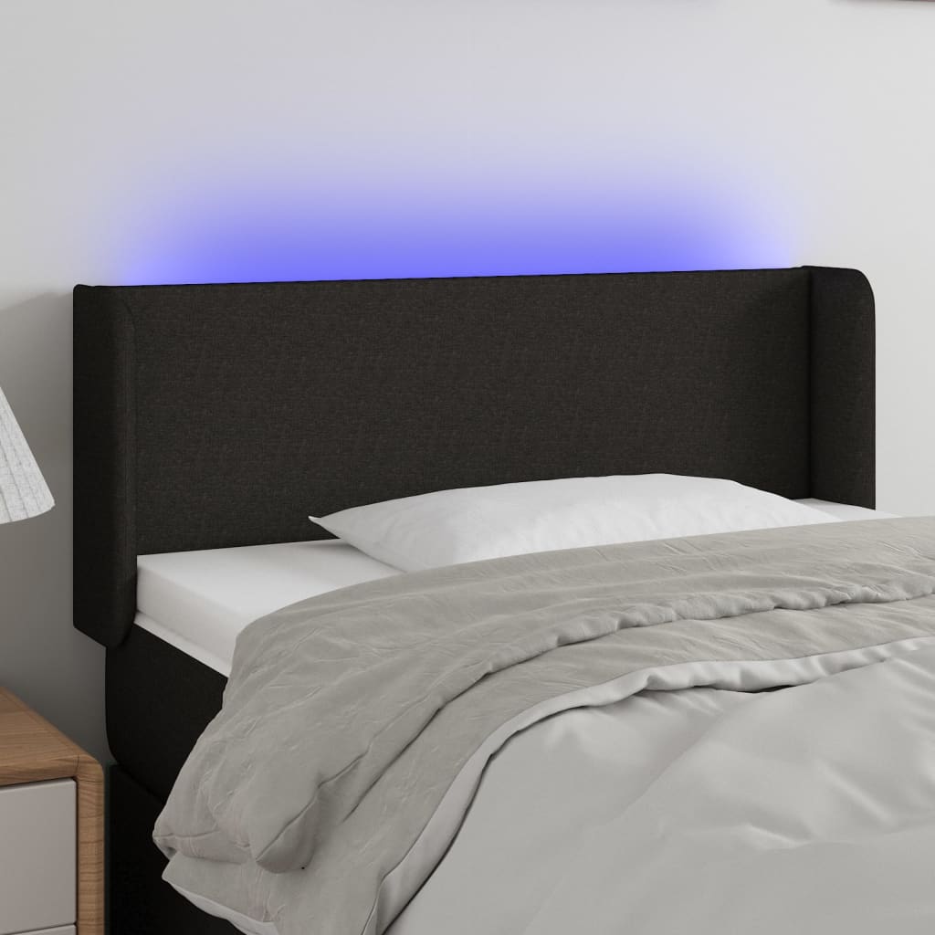 sengegavl med LED-lys 83x16x78/88 cm stof sort