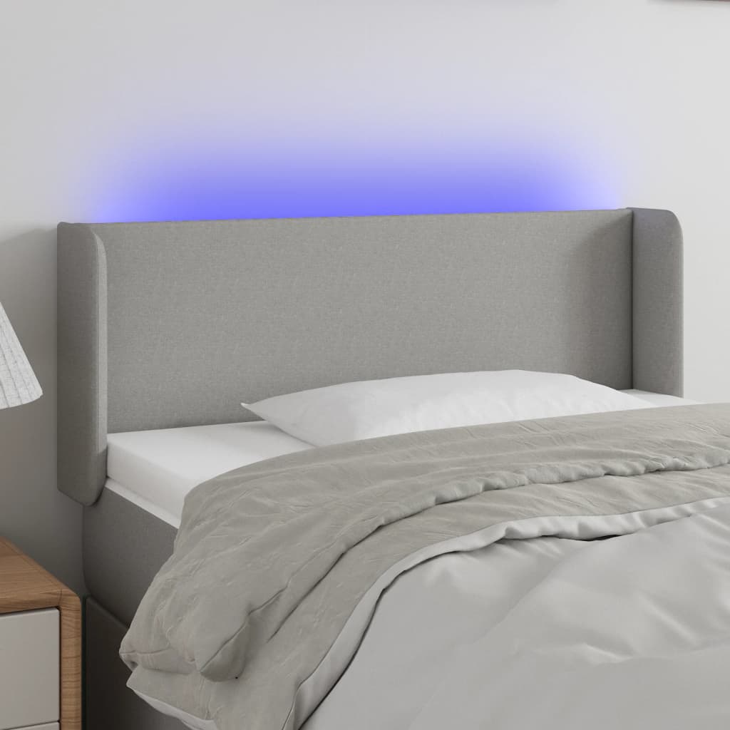 sengegavl med LED-lys 93x16x78/88 cm stof lysegrå