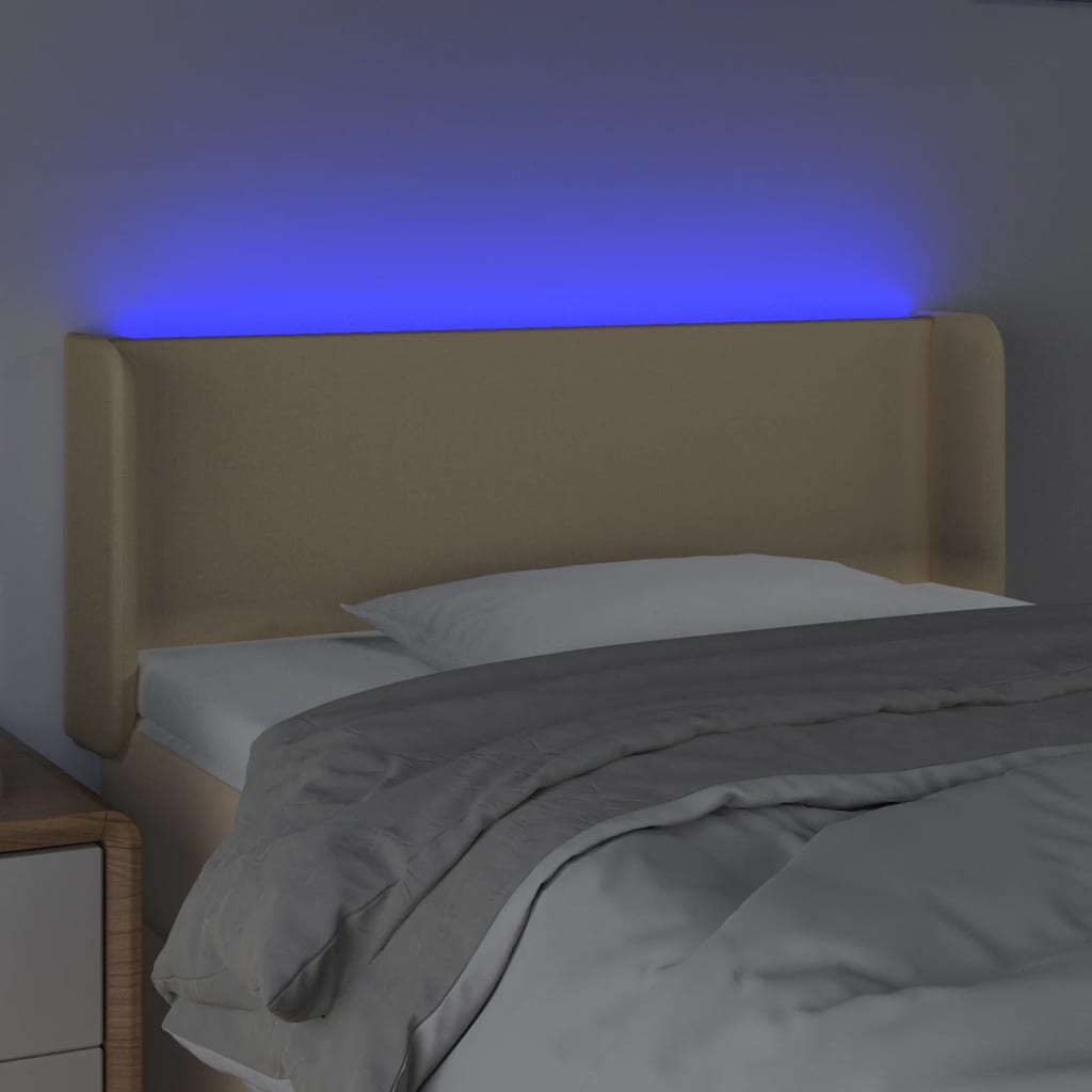 sengegavl med LED-lys 103x16x78/88 cm stof cremefarvet