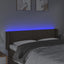 sengegavl med LED-lys 147x16x78/88 cm stof gråbrun