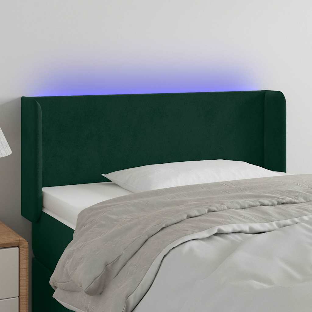 sengegavl med LED-lys 83x16x78/88 cm fløjl Mørkegrøn