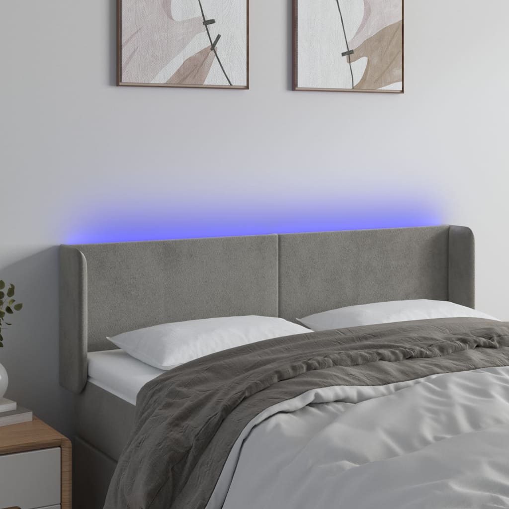 sengegavl med LED-lys 147x16x78/88 cm fløjl lysegrå