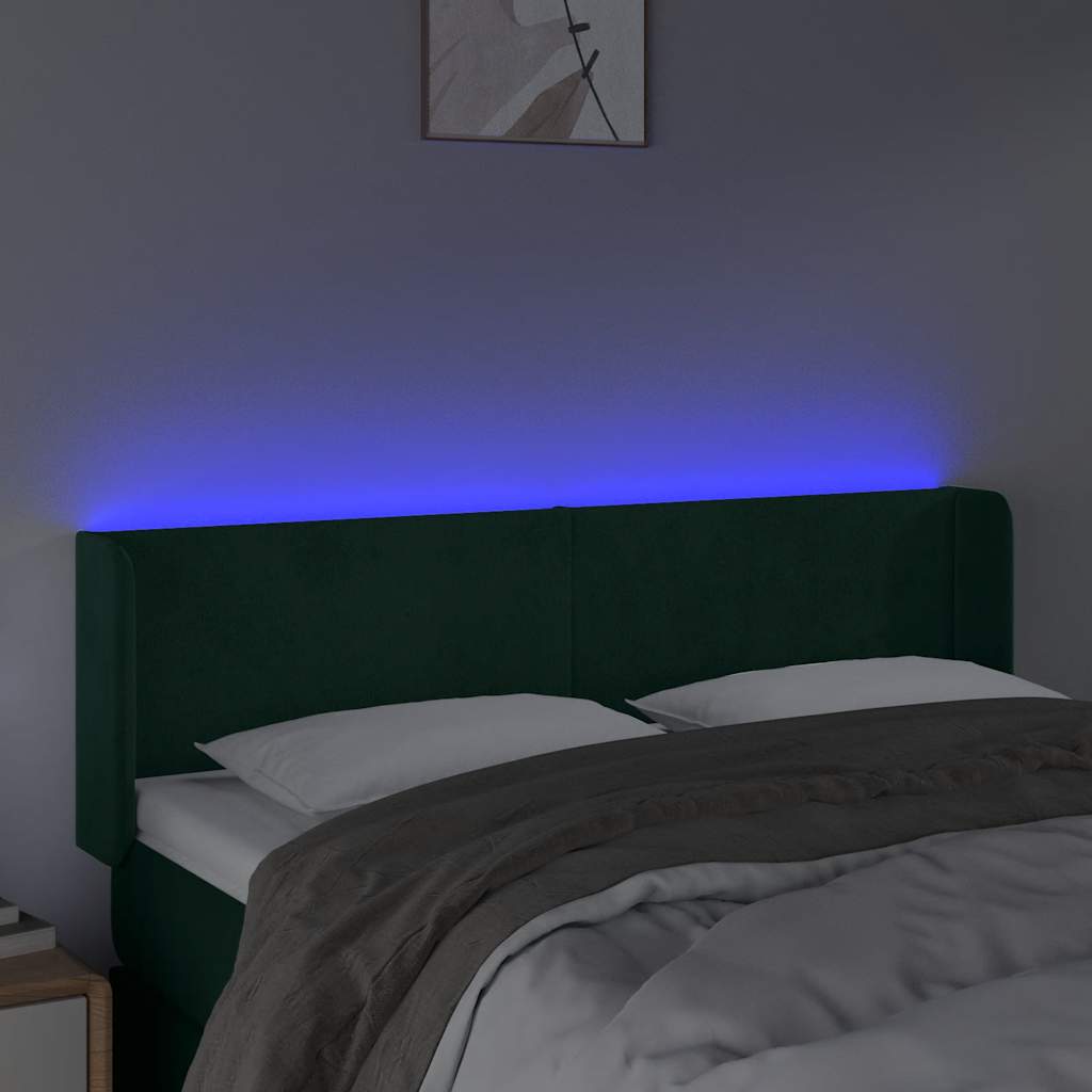 sengegavl med LED-lys 147x16x78/88 cm fløjl mørkegrøn