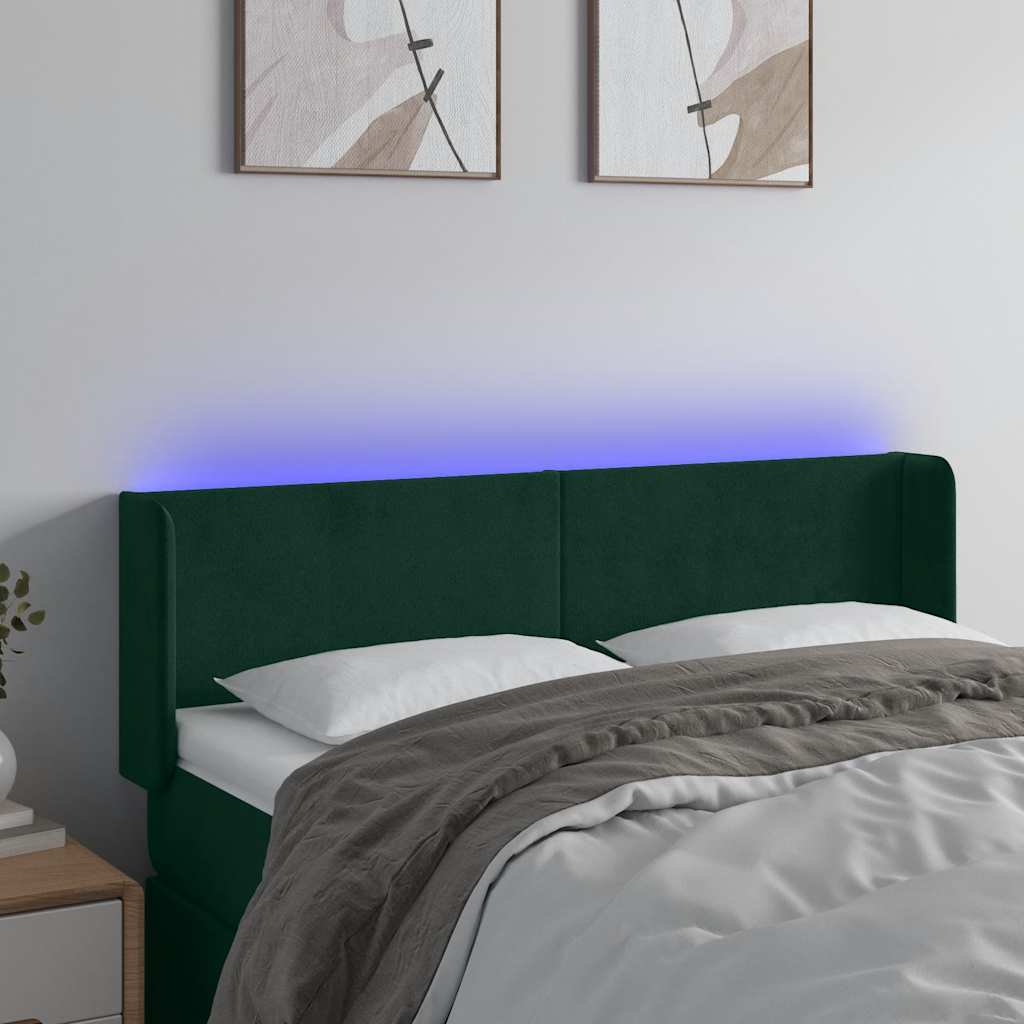 sengegavl med LED-lys 147x16x78/88 cm fløjl mørkegrøn