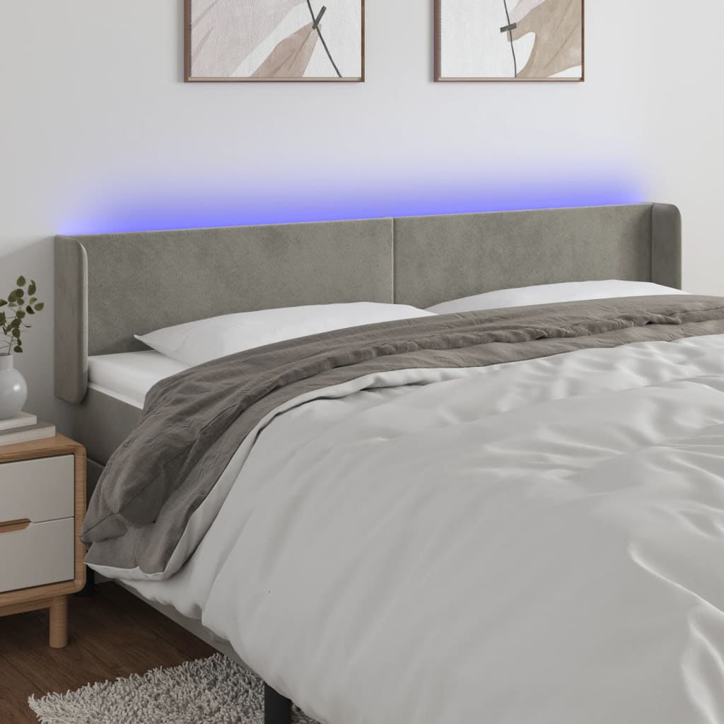 sengegavl med LED-lys 163x16x78/88 cm fløjl lysegrå