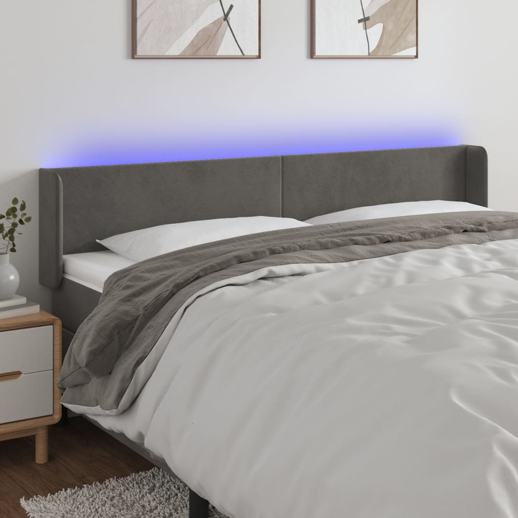 sengegavl med LED-lys 163x16x78/88 cm fløjl mørkegrå