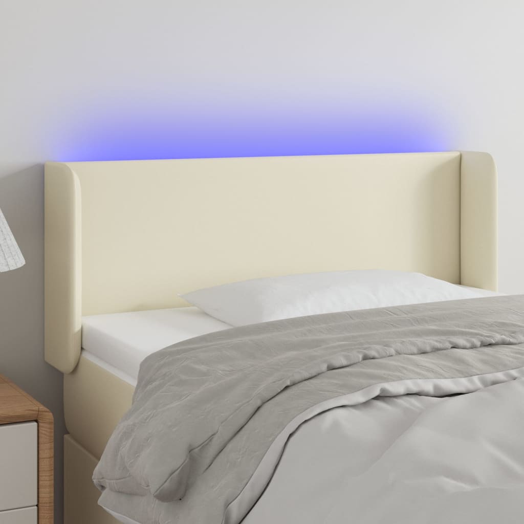 sengegavl med LED-lys 83x16x78/88 cm kunstlæder cremefarvet