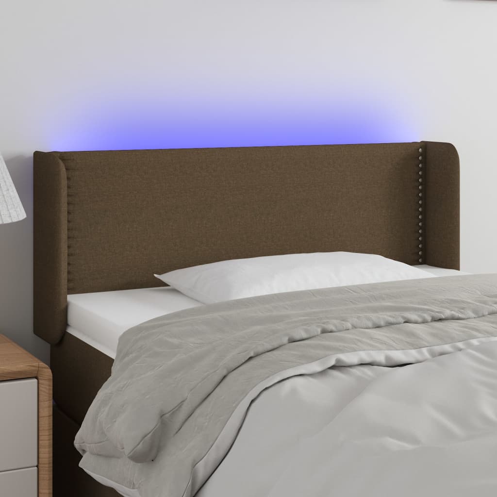 sengegavl med LED-lys 103x16x78/88 cm stof mørkebrun