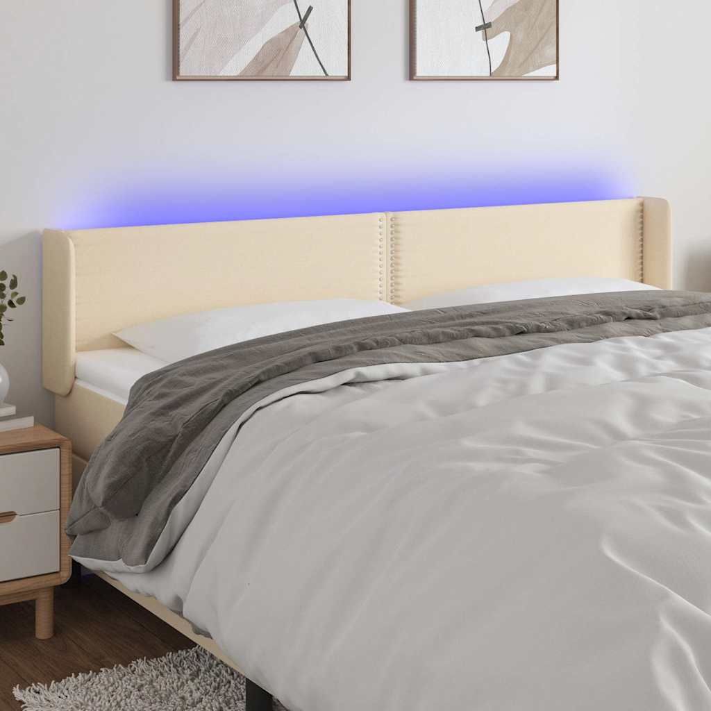 sengegavl med LED-lys 203x16x78/88 cm stof cremefarvet
