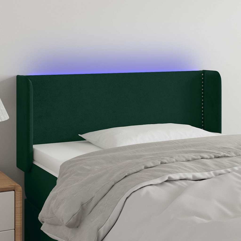 sengegavl med LED-lys 83x16x78/88 cm fløjl Mørkegrøn