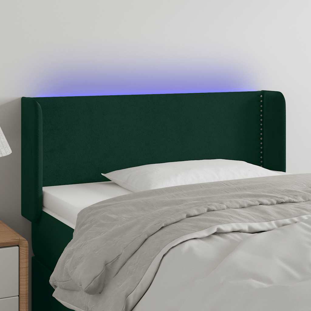 sengegavl med LED-lys 103x16x78/88 cm fløjl mørkegrøn