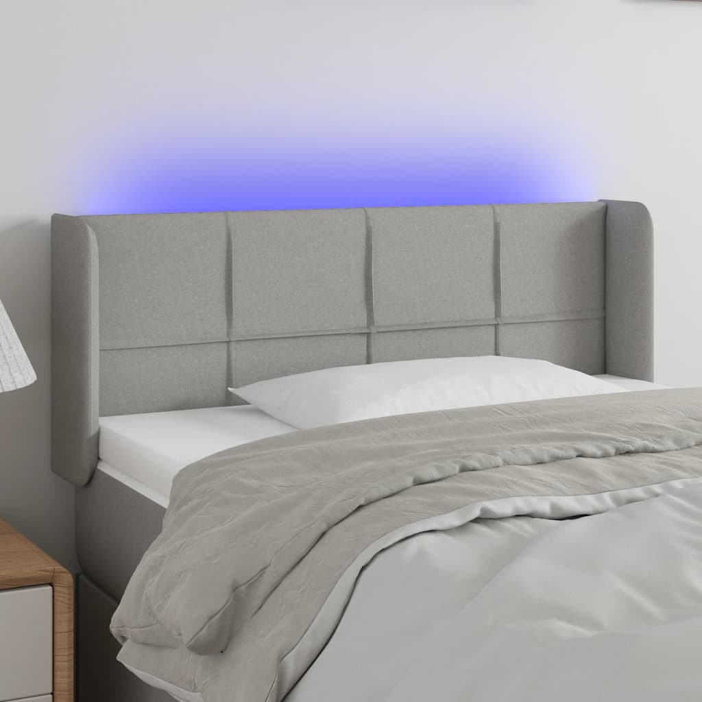 sengegavl med LED-lys 83x16x78/88 cm stof lysegrå