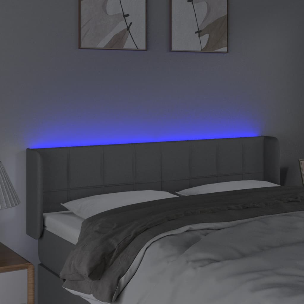 sengegavl med LED-lys 147x16x78/88 cm stof lysegrå