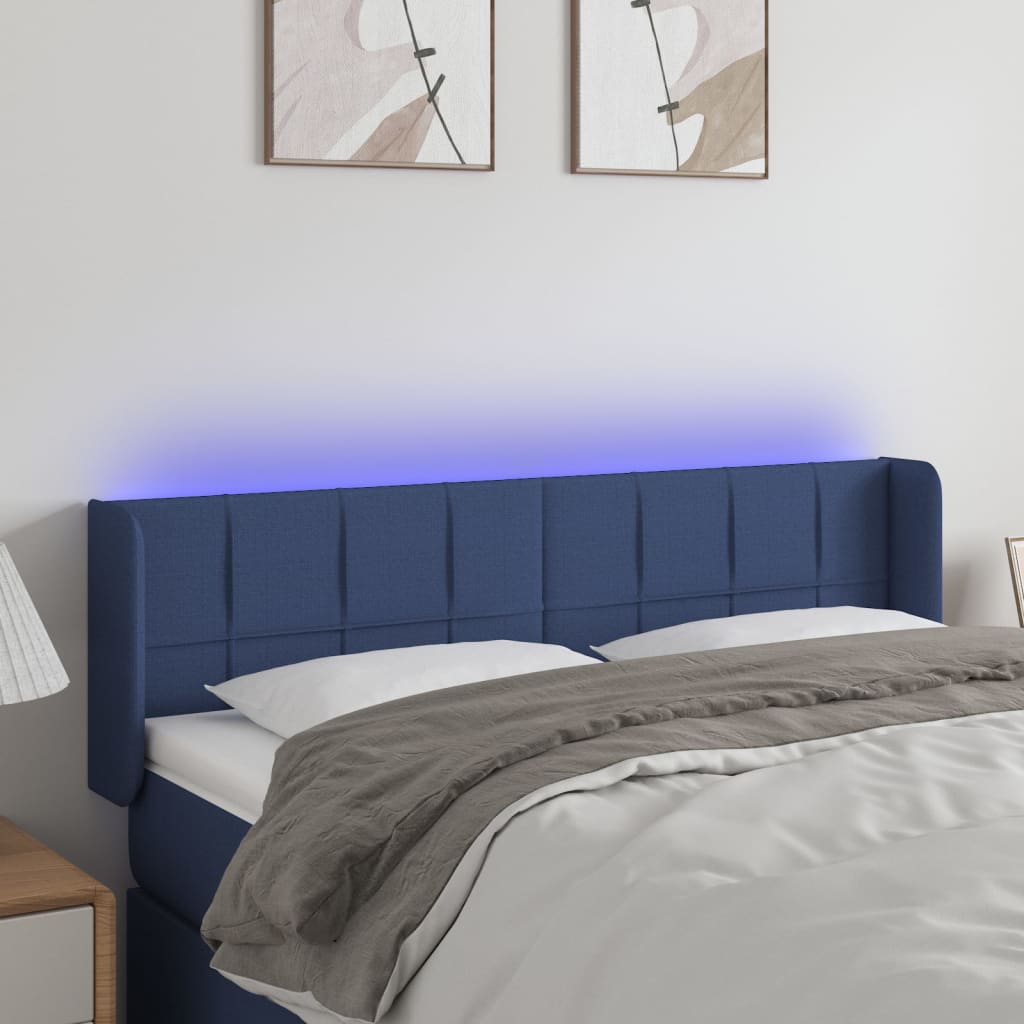 sengegavl med LED-lys 147x16x78/88 cm stof blå