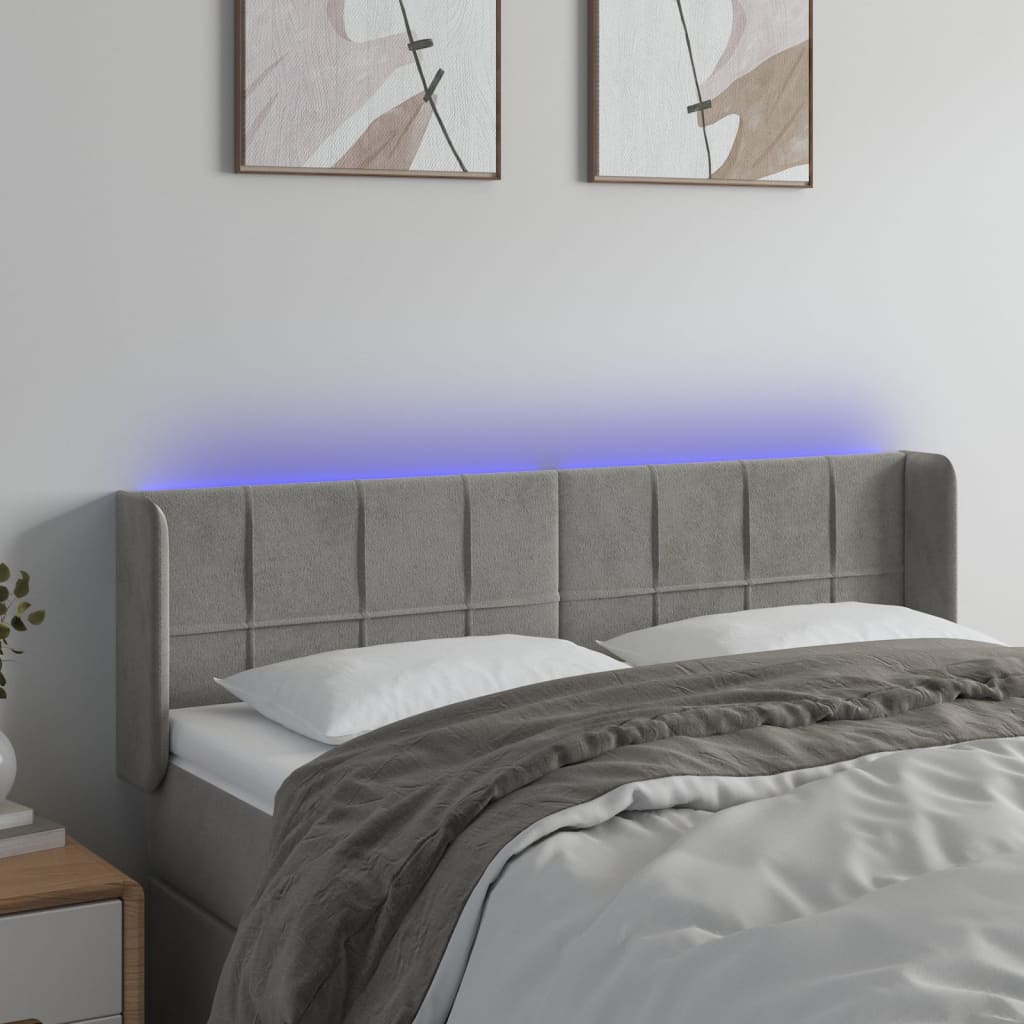 sengegavl med LED-lys 147x16x78/88 cm fløjl lysegrå