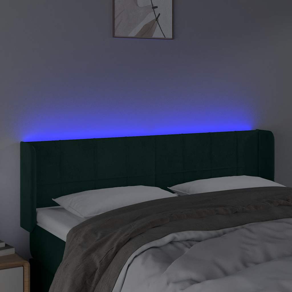 sengegavl med LED-lys 147x16x78/88 cm fløjl mørkegrøn