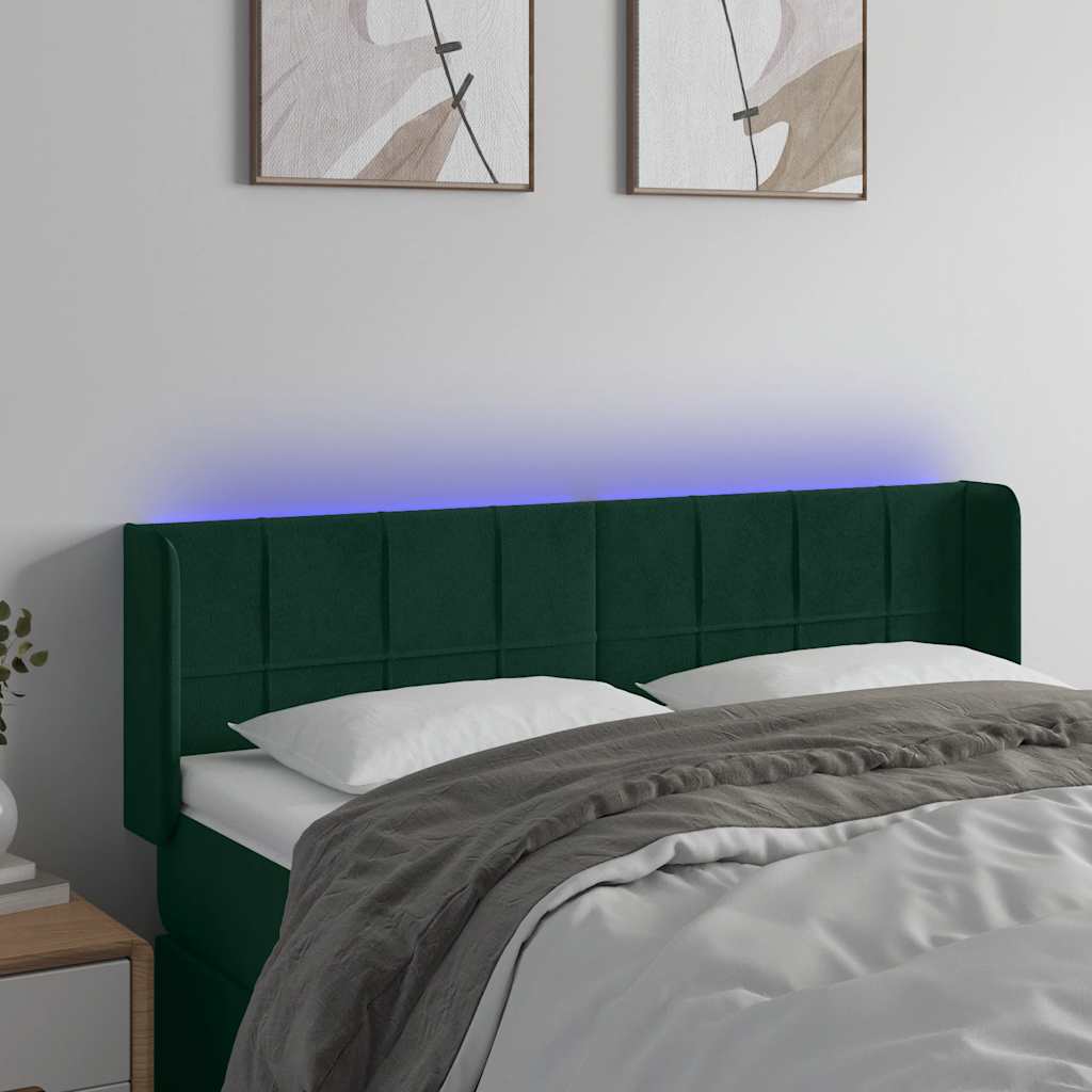 sengegavl med LED-lys 147x16x78/88 cm fløjl mørkegrøn