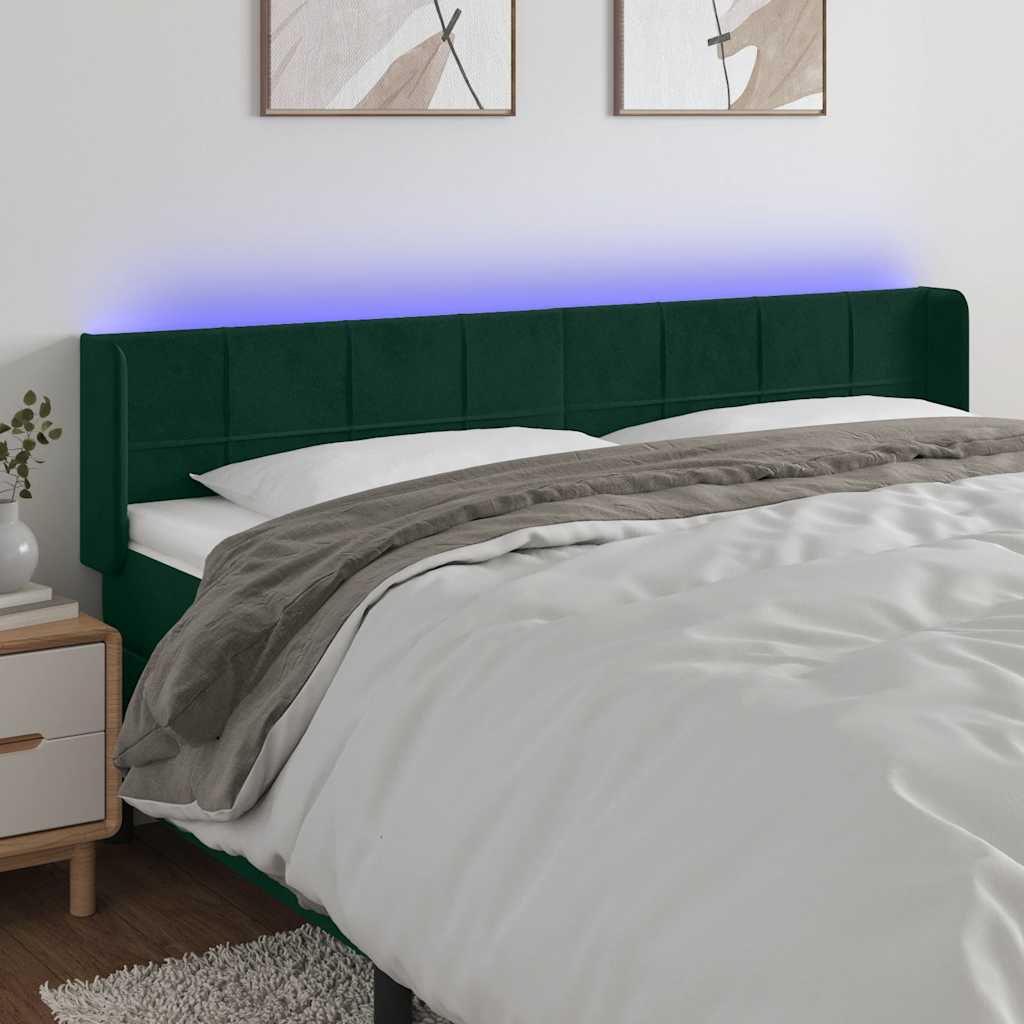 sengegavl med LED-lys 163x16x78/88 cm fløjl mørkegrøn