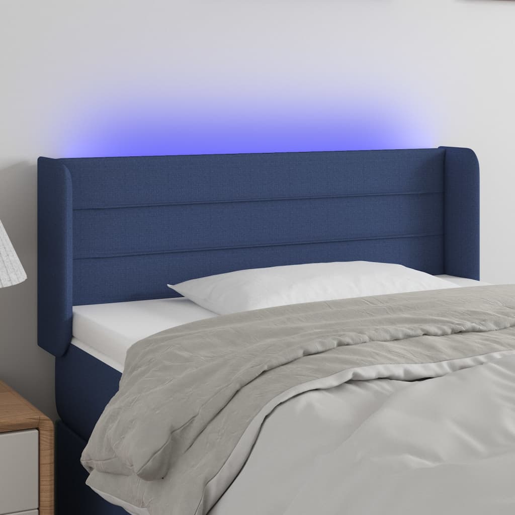 sengegavl med LED-lys 103x16x78/88 cm stof blå