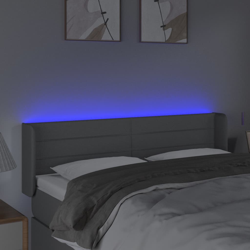 sengegavl med LED-lys 147x16x78/88 cm stof lysegrå