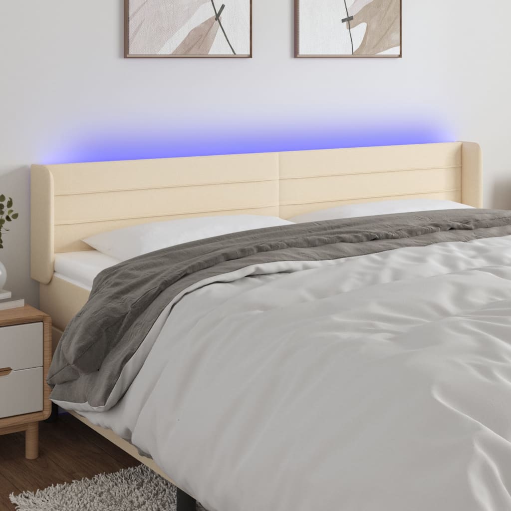 sengegavl med LED-lys 203x16x78/88 cm stof cremefarvet