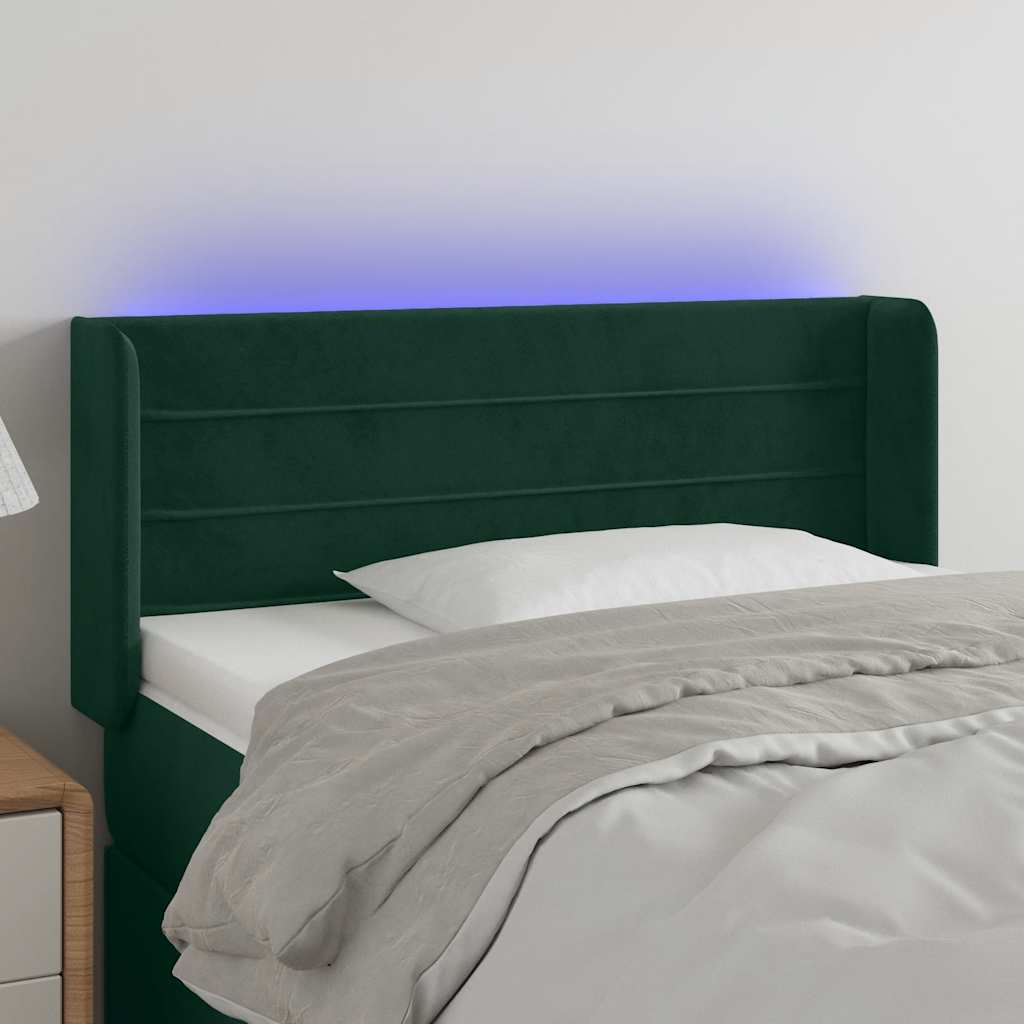sengegavl med LED-lys 103x16x78/88 cm fløjl mørkegrøn