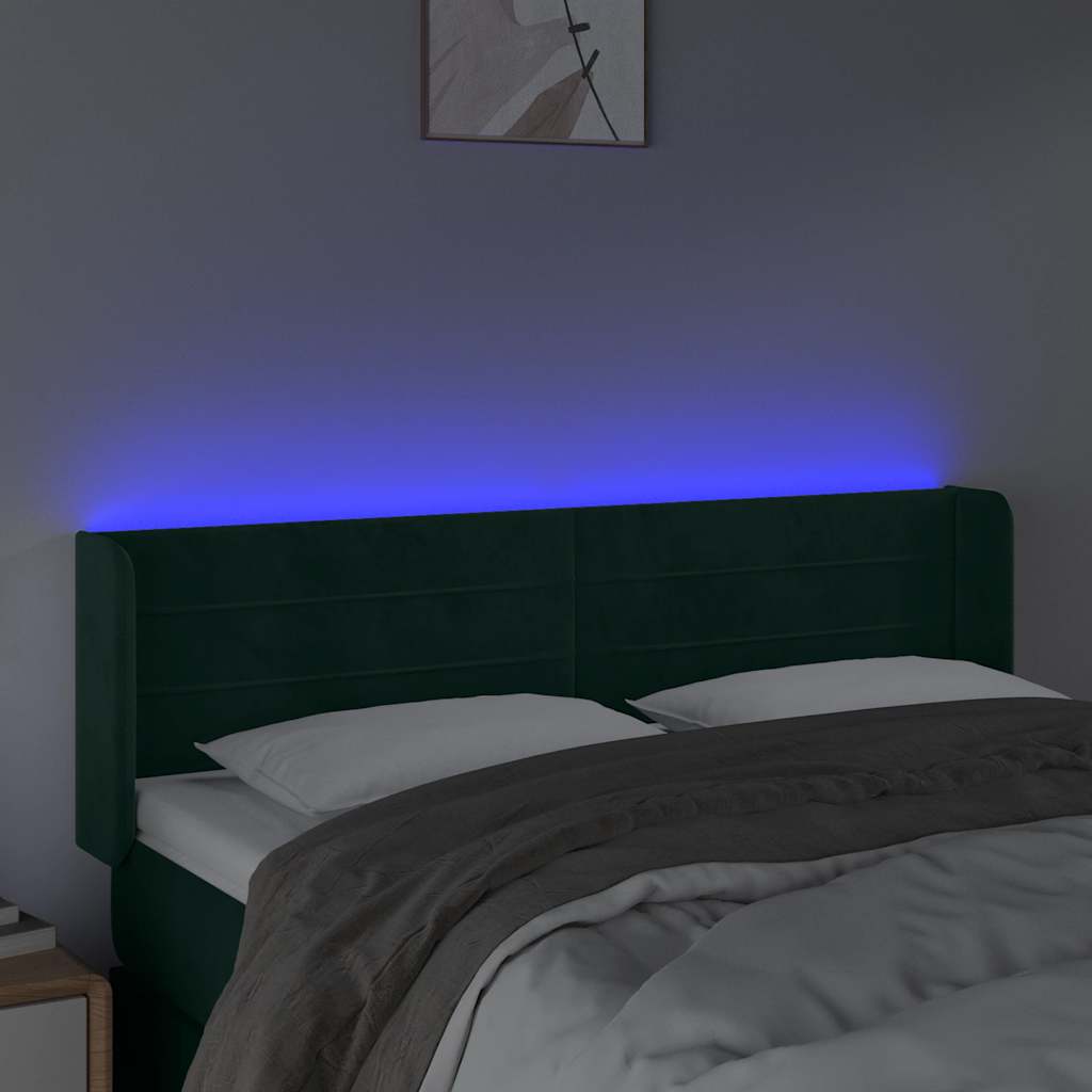 sengegavl med LED-lys 147x16x78/88 cm fløjl mørkegrøn