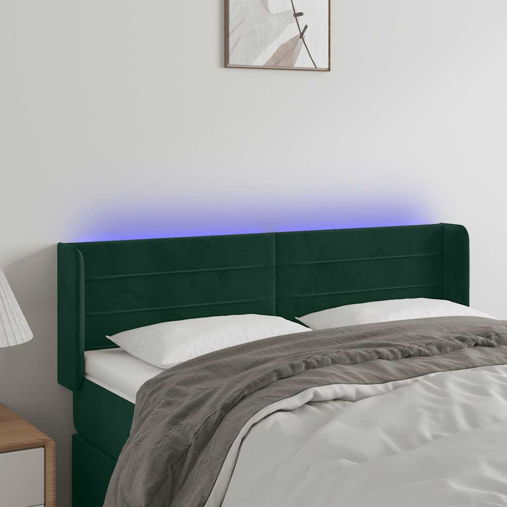 sengegavl med LED-lys 147x16x78/88 cm fløjl mørkegrøn