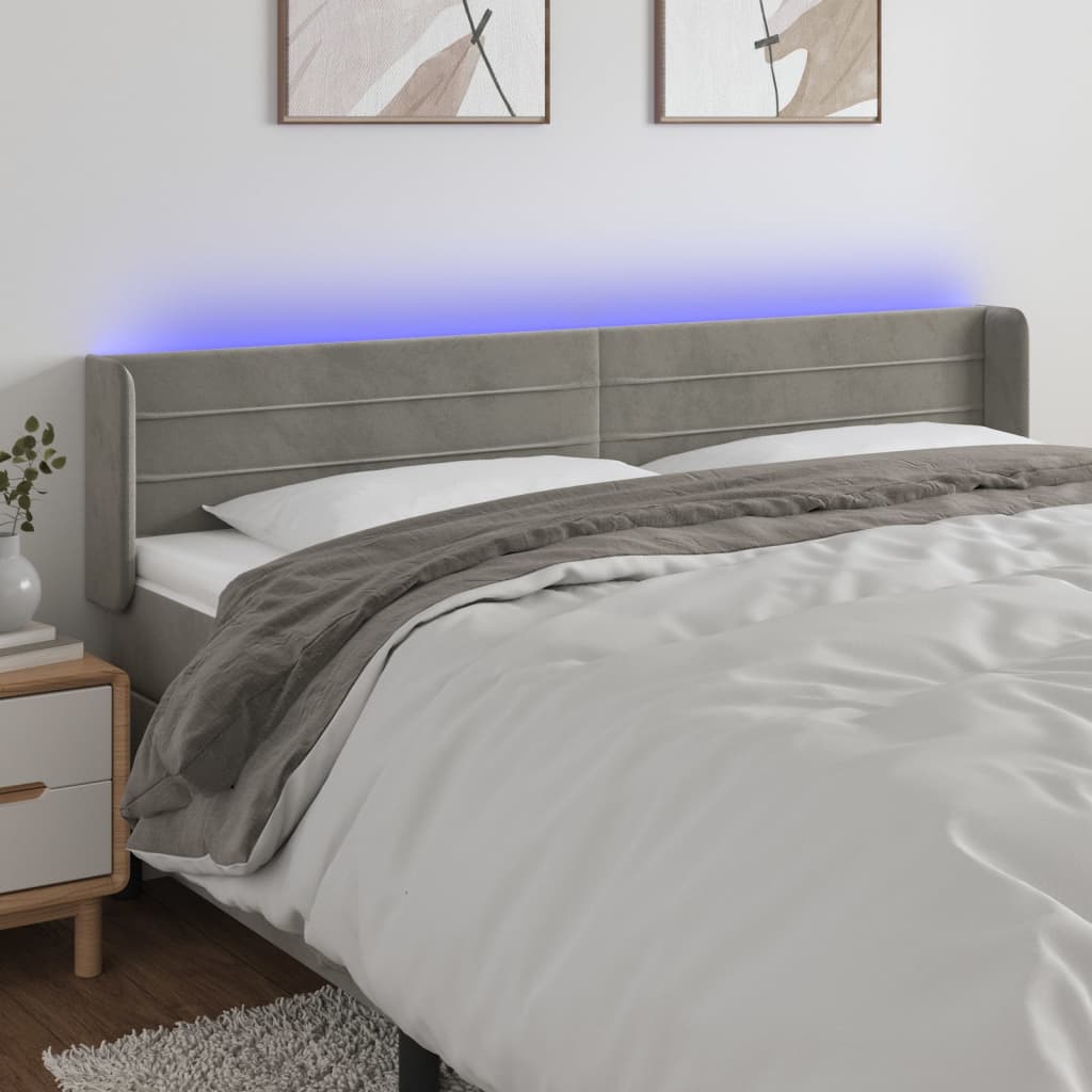sengegavl med LED-lys 163x16x78/88 cm fløjl lysegrå