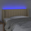 sengegavl med LED-lys 93x16x78/88 cm stof cremefarvet