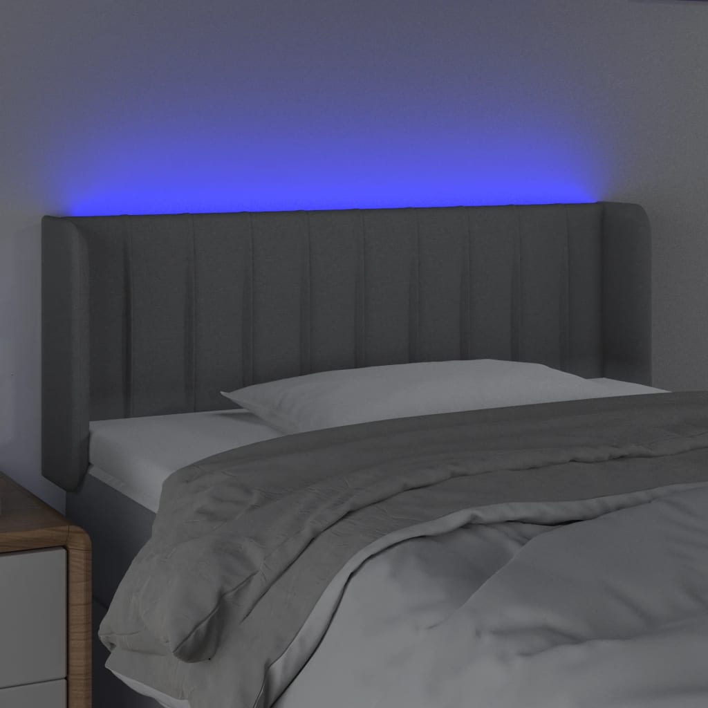 sengegavl med LED-lys 103x16x78/88 cm stof lysegrå