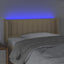 sengegavl med LED-lys 103x16x78/88 cm stof cremefarvet