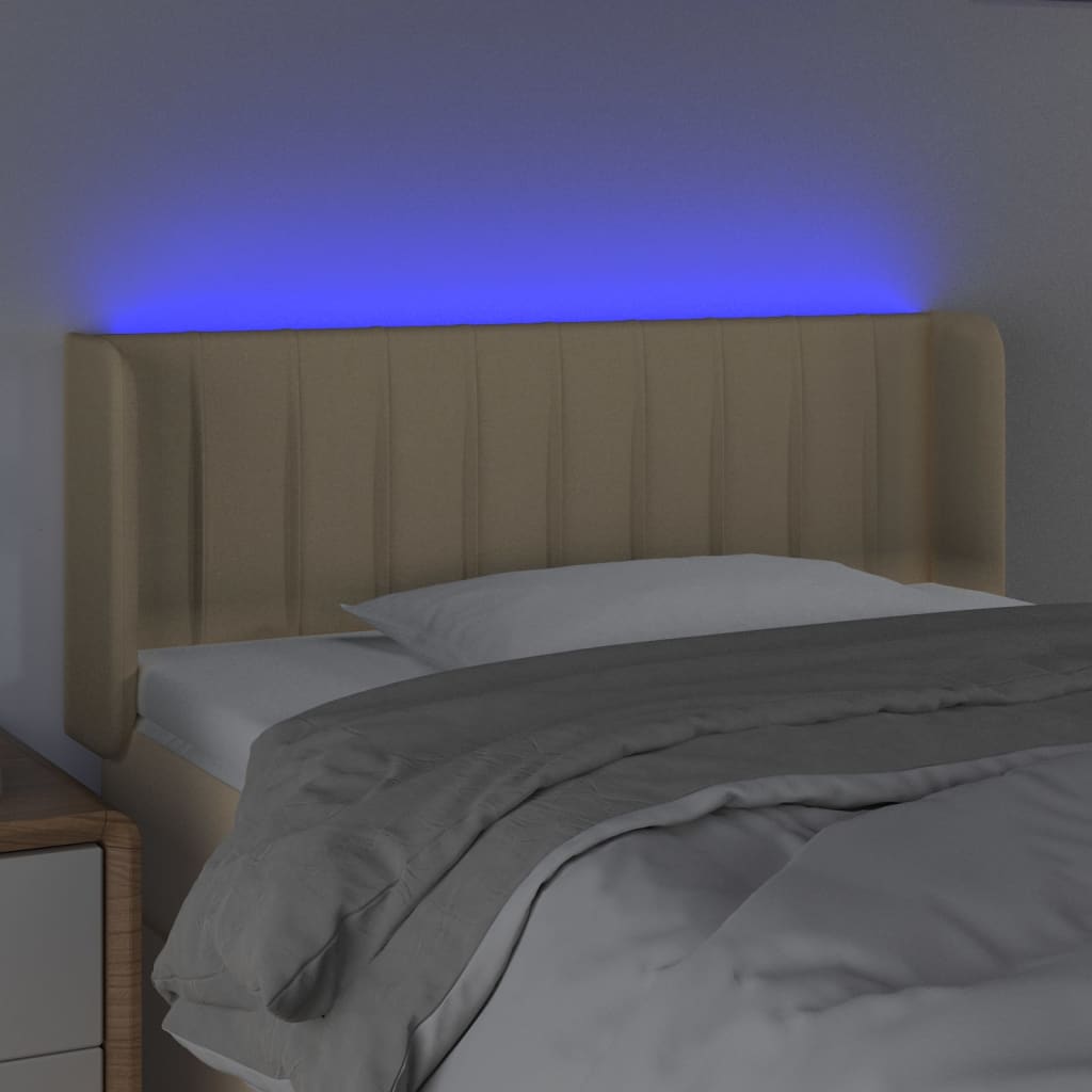 sengegavl med LED-lys 103x16x78/88 cm stof cremefarvet