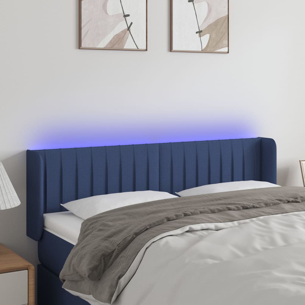 sengegavl med LED-lys 147x16x78/88 cm stof blå