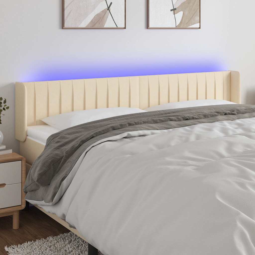 sengegavl med LED-lys 163x16x78/88 cm stof cremefarvet