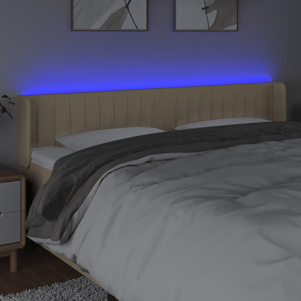 sengegavl med LED-lys 203x16x78/88 cm stof cremefarvet