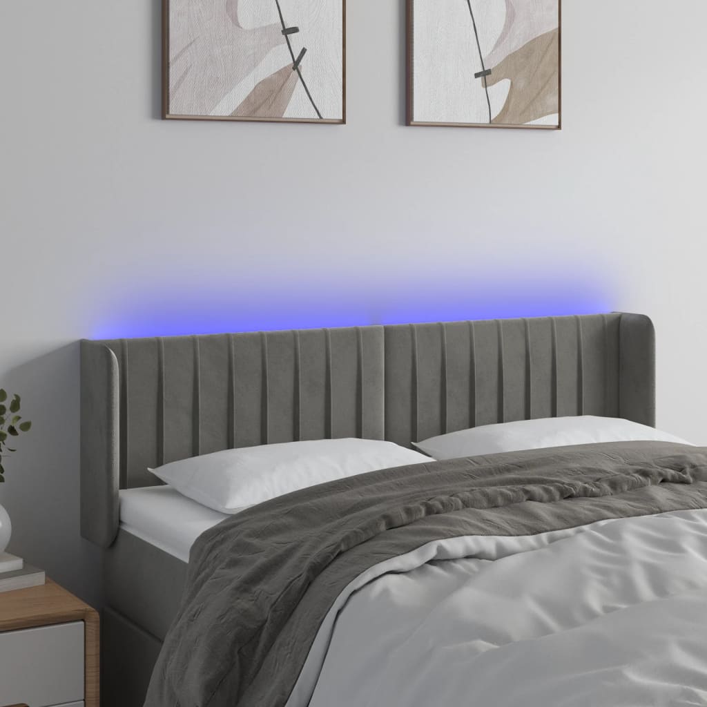 sengegavl med LED-lys 147x16x78/88 cm fløjl lysegrå