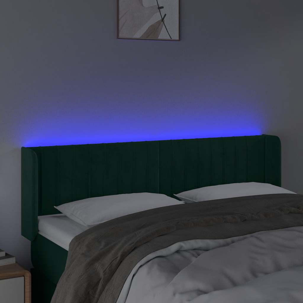 sengegavl med LED-lys 147x16x78/88 cm fløjl mørkegrøn