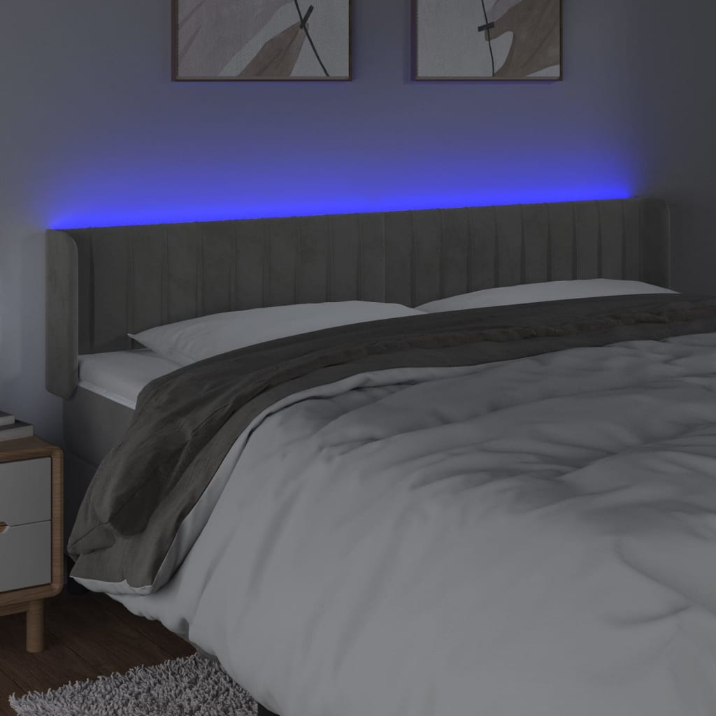 sengegavl med LED-lys 163x16x78/88 cm fløjl lysegrå