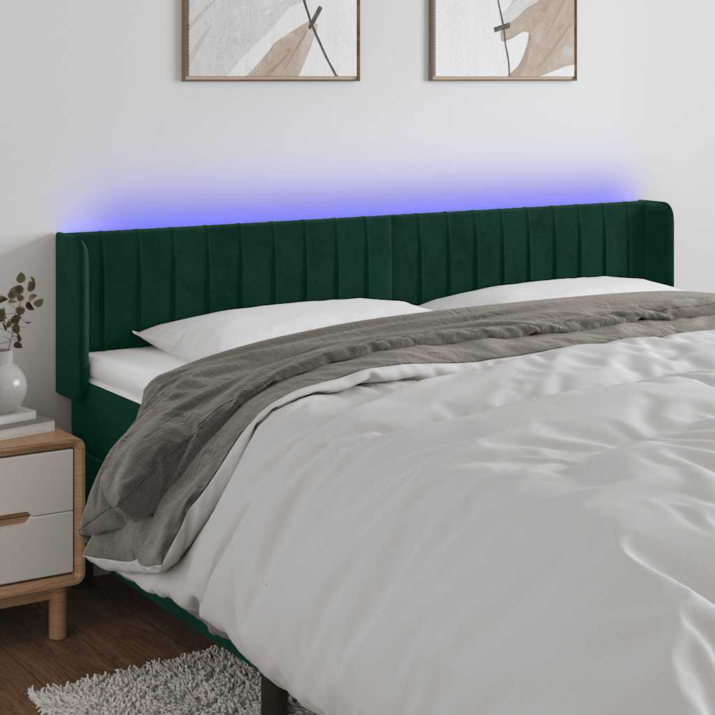 sengegavl med LED-lys 163x16x78/88 cm fløjl mørkegrøn